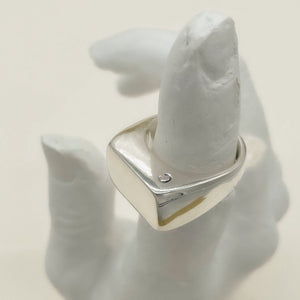 close up chunky silver signet ring